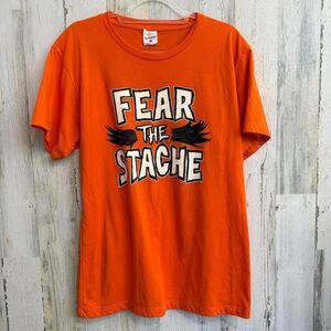 Vintage Charlie Hustle 'Fear The Stache' Orange T-Shirt Large Graphic Tee Shirt